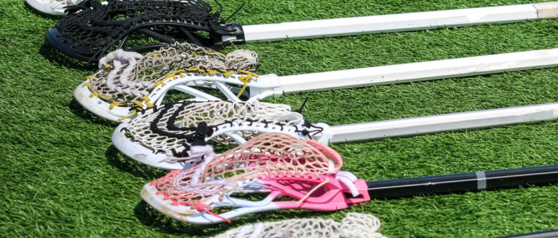 Lacrosse Sticks on field